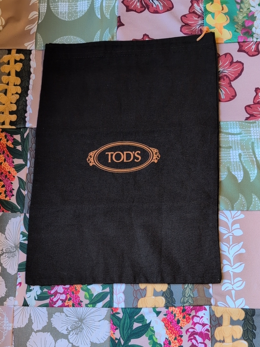 TOD'S Black Dust Bag with Orange Logo Accent